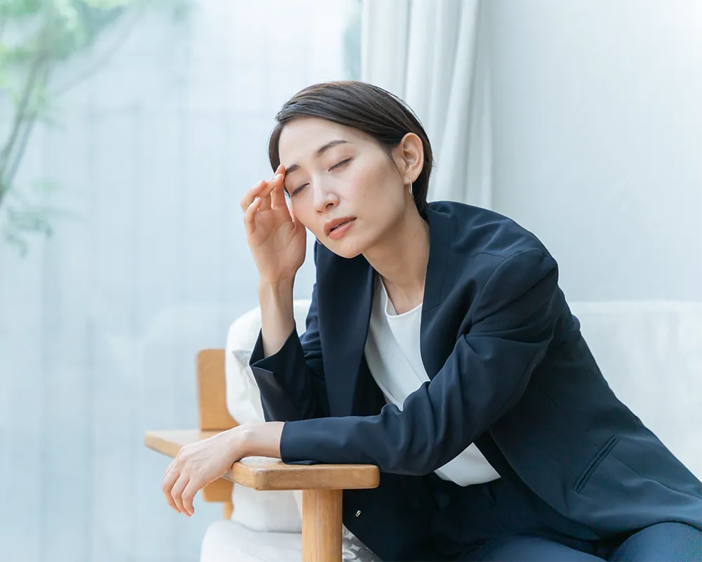 気分が悪い女性